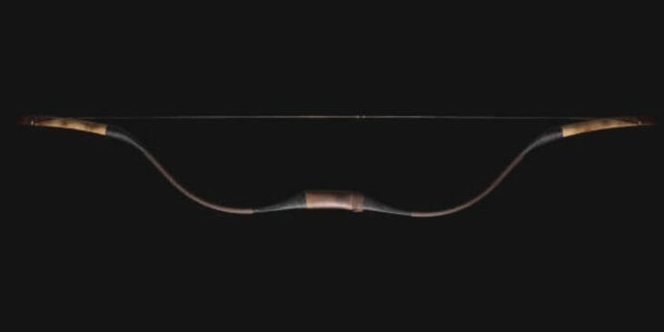 recurve bow on a black background